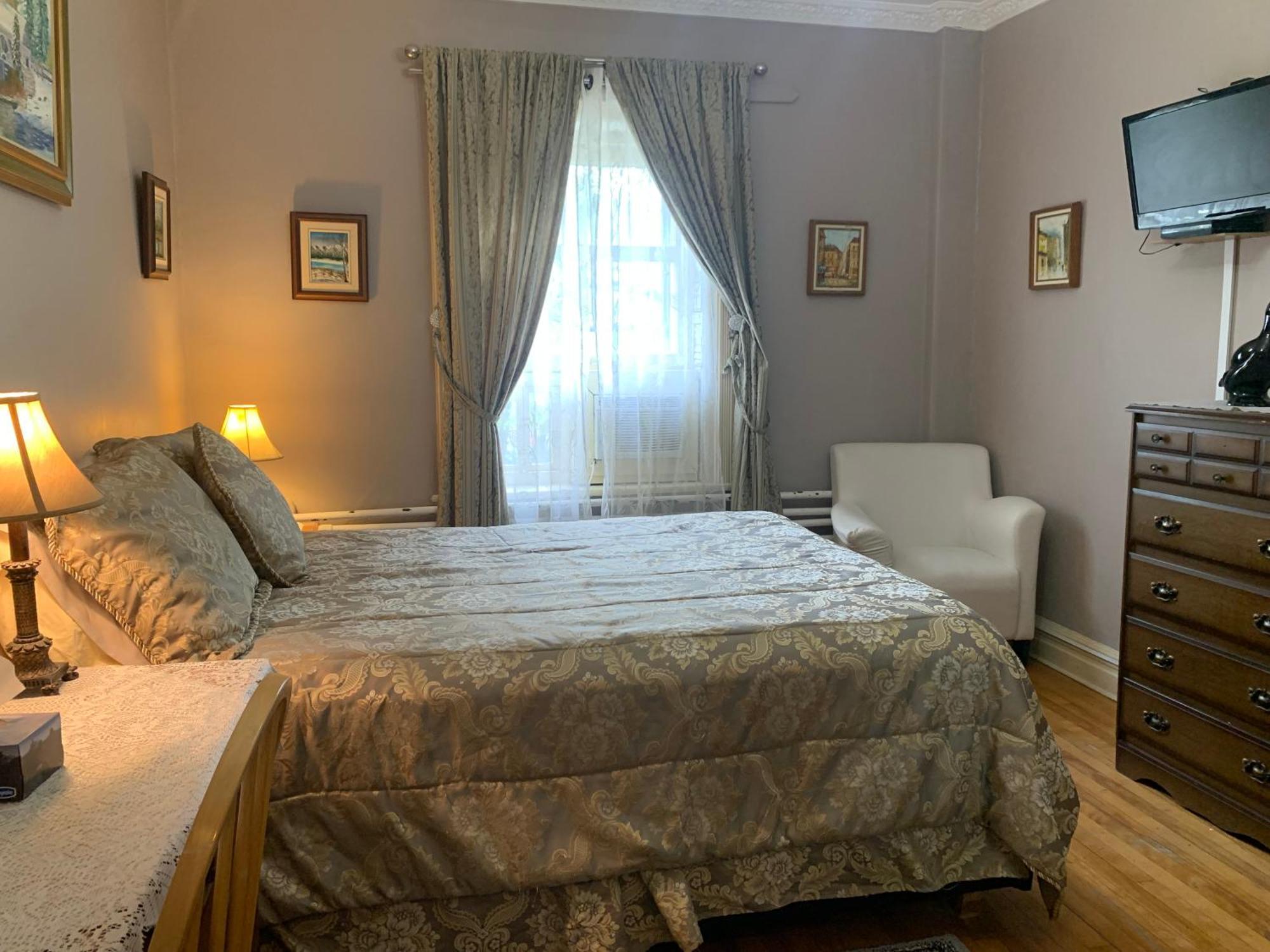 Chambre Deluxe (1 Adulte + 1 Enfant)
